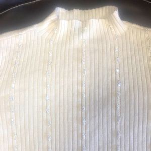 Off white sweater with clear beads on front